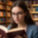 A person immersed in reading a book with a thoughtful expression.