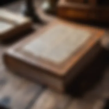 An aged book with a textured cover resting on a wooden table