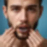 Symbolic representation of a young man with nails in his mouth